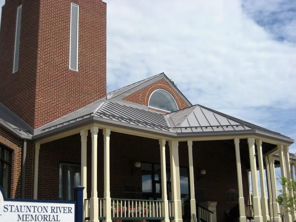 Skilled roofing craftsmen working on a residential roof in Highspire
